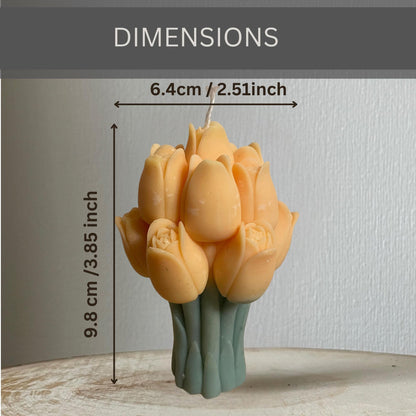 La Bouqe tulip bouquet candle with orange tulip petals and green stems measuring 3.85 inches tall