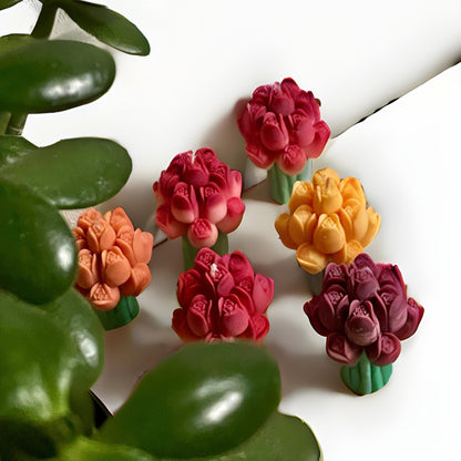 La Bouqe colorful tulip bouquet candle set with red orange and purple flower designs on white background